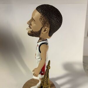 Basketball Player Bobblehead with Eiffel Tower